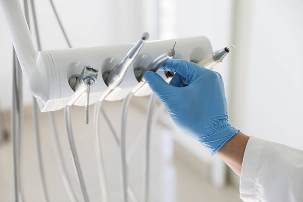 Professional Tooth Extraction technician working in LaSalle County County, IL